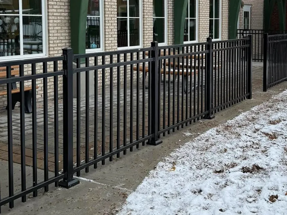 Ornamental steel fence installation